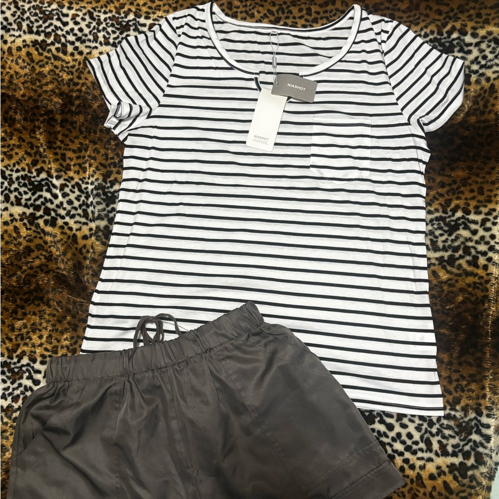 Black and White Striped T-Shirt with Gray Shorts